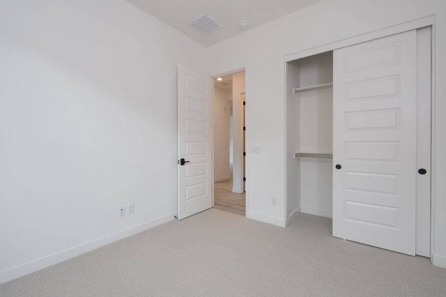 Spacious, unfurnished interior of a new home in Waterston Central, Gilbert (Image 15).