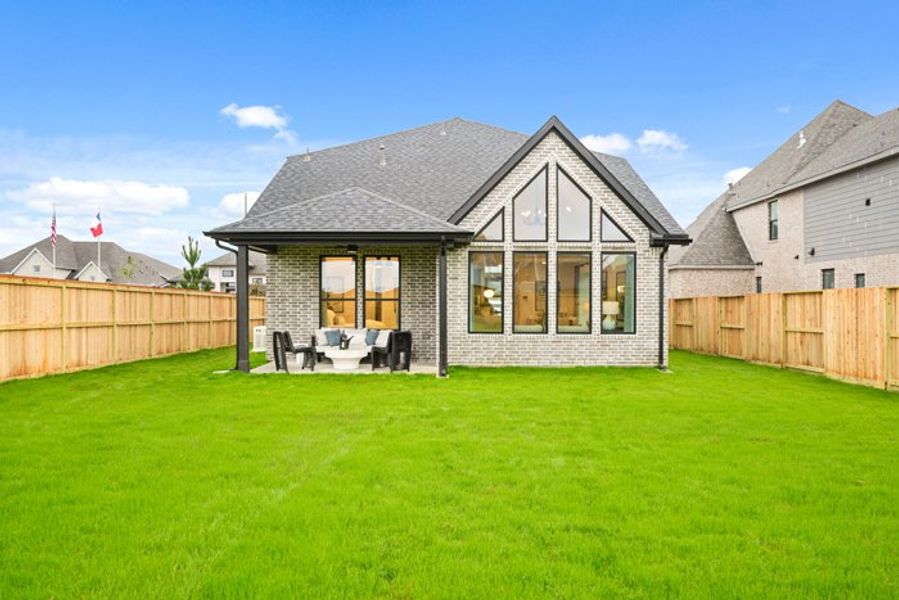 Exterior details and patio area of a home in Meridiana 40', 65', Iowa Colony (Image 29).