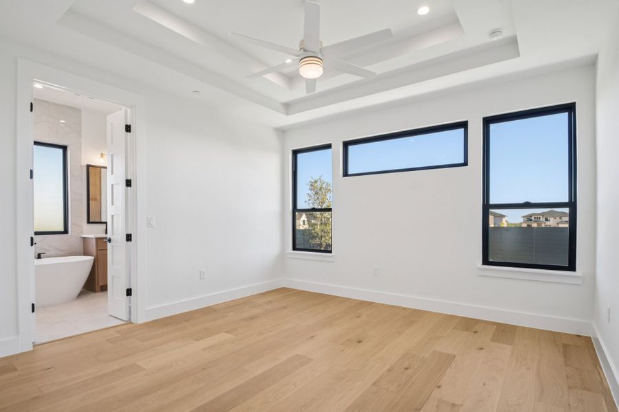 Spacious, unfurnished interior of a new home in Milky Way at River Place, Austin (Image 37).