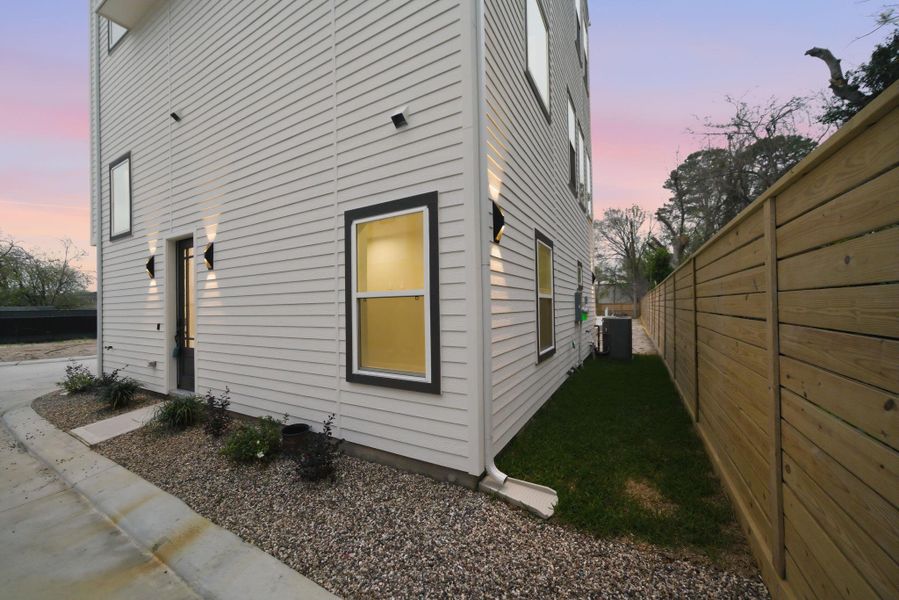 Exterior details and patio area of a home in , Houston (Image 3).