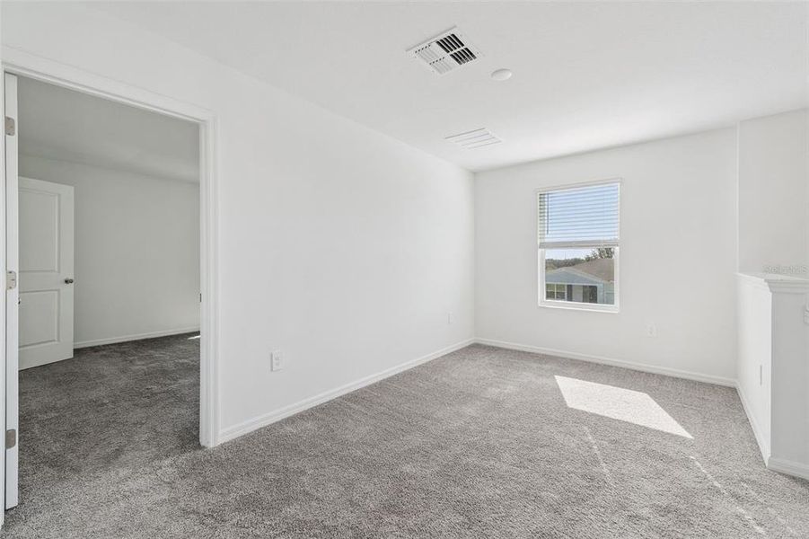 Spacious, unfurnished interior of a new home in Peace Creek Reserve: Legacy Collection, Winter Haven (Image 6). Spacious, unfurnished interior of a new home in Peace Creek Reserve: Legacy Collection, Winter Haven (Image 6).