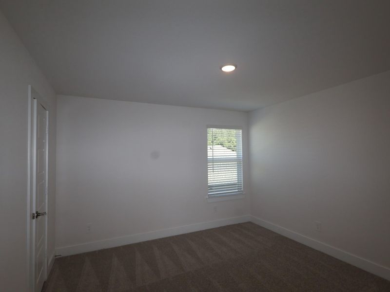 Spacious, unfurnished interior of a new home in Sorella, Tomball (Image 23).