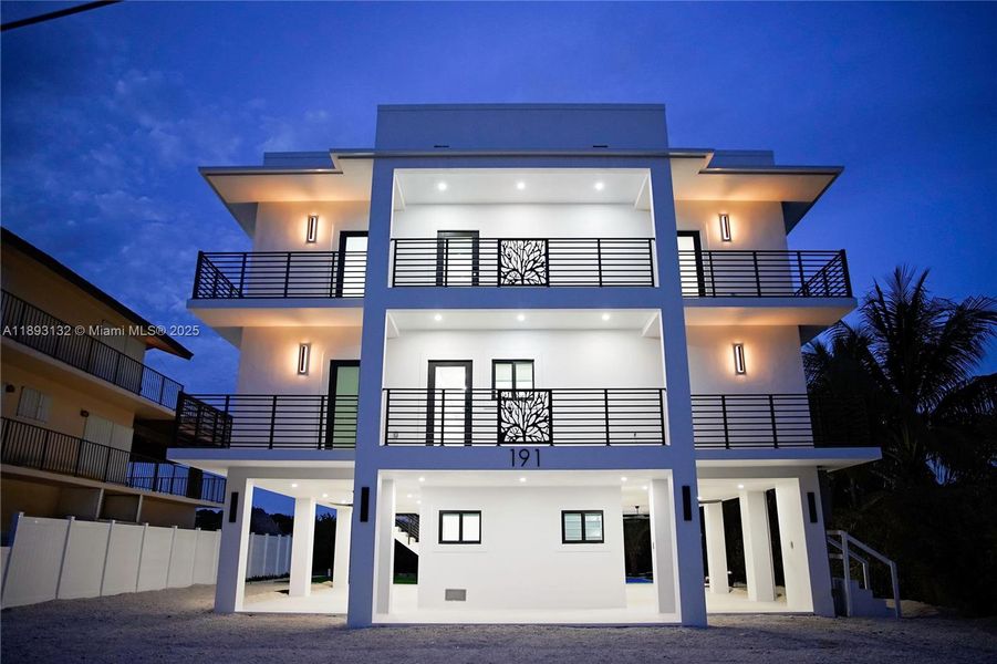Front exterior of a new home in , Tavernier, FL, highlighting curb appeal (Image 23).