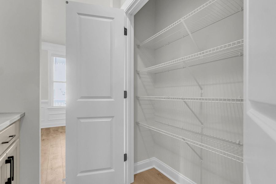 Spacious, unfurnished interior of a new home in Tidewater at Lakes of Cane Bay, Summerville (Image 23).