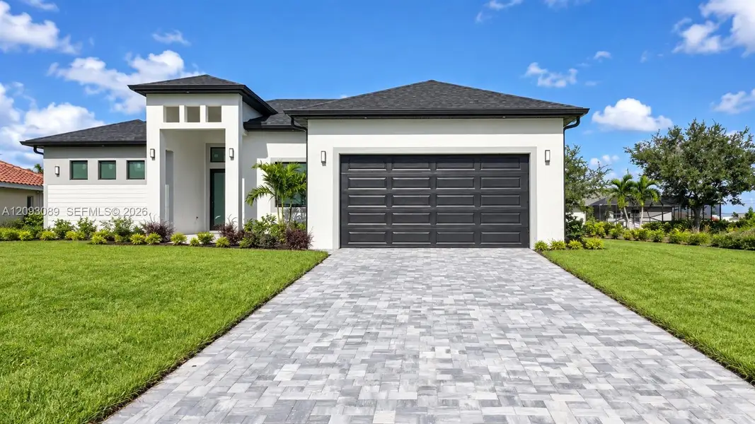 Front exterior of a new home in , Cape Coral, FL, highlighting curb appeal (Image 23).