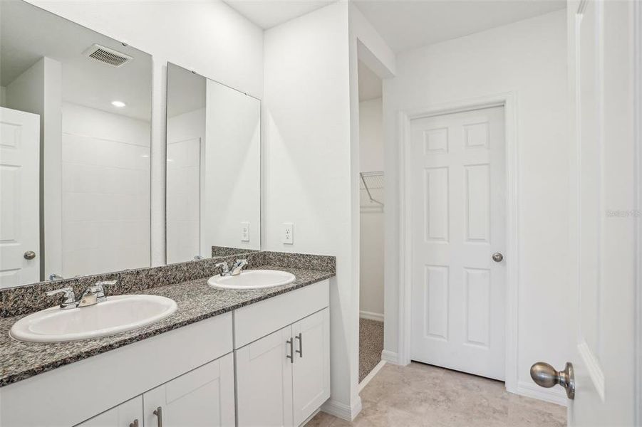 Furnished interior view inside a new home in Lake Deer Estates - Signature Series, Poinciana (Image 15). Furnished interior view inside a new home in Lake Deer Estates - Signature Series, Poinciana (Image 15).