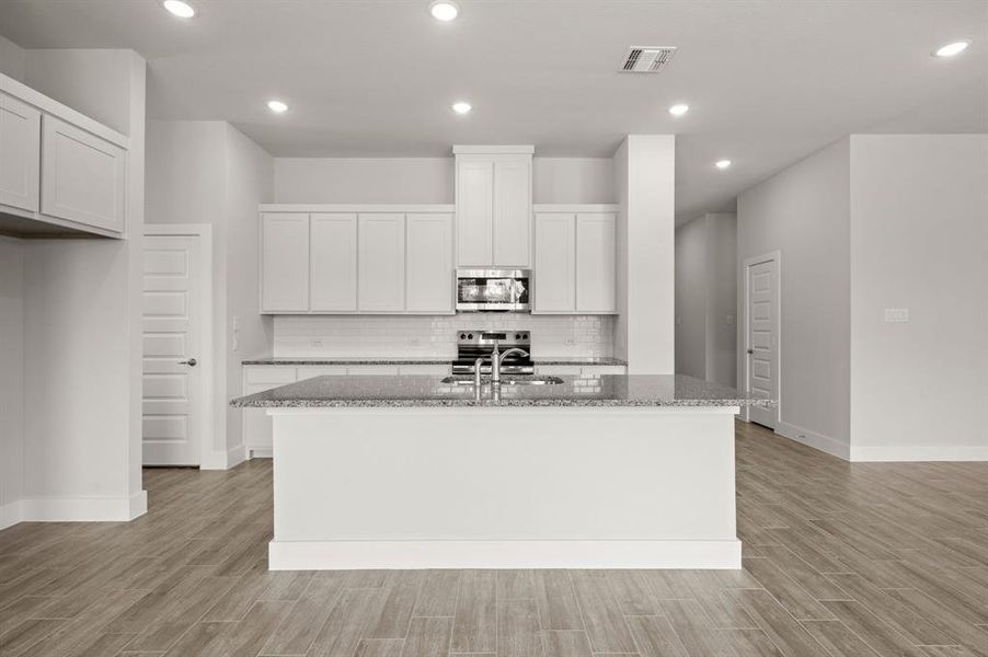 Furnished interior view inside a new home in Saddleback Estates, Boyd (Image 13).