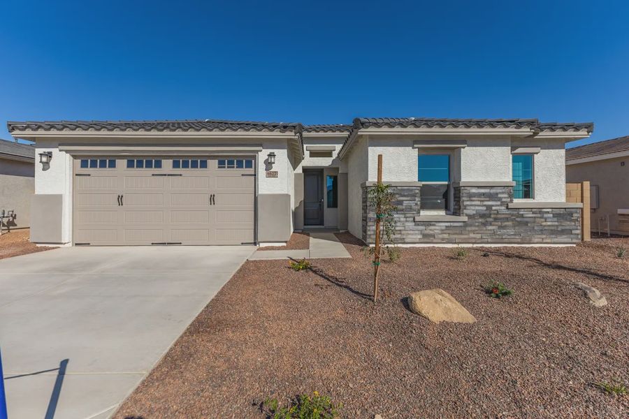 Front exterior of a new home in Forté at Granite Vista, Waddell, AZ, highlighting curb appeal (Image 1). Front exterior of a new home in Forté at Granite Vista, Waddell, AZ, highlighting curb appeal (Image 1).
