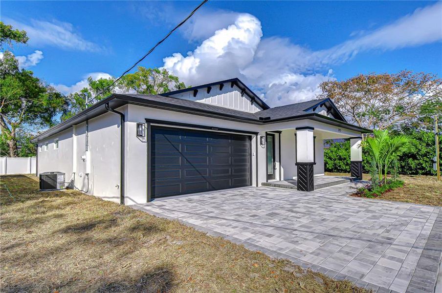 Front exterior of a new home in , Tampa, FL, highlighting curb appeal (Image 2). Front exterior of a new home in , Tampa, FL, highlighting curb appeal (Image 2).
