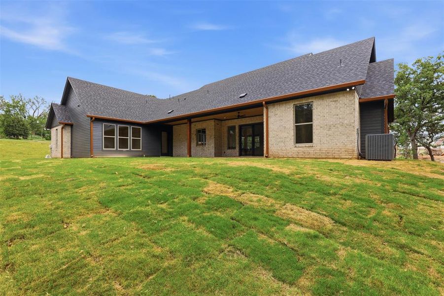 Exterior details and patio area of a home in , Granbury (Image 31). Exterior details and patio area of a home in , Granbury (Image 31).