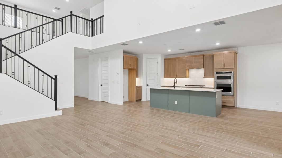 Representative furnished interior of a home built from the Phoenician by D.R. Horton in The Ridge at Stone Butte, Phoenix (Image 6).