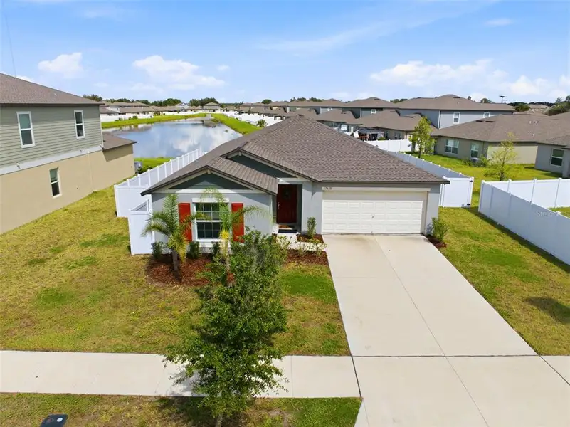 Front exterior of a new home in , Riverview, FL, highlighting curb appeal (Image 27). Front exterior of a new home in , Riverview, FL, highlighting curb appeal (Image 27).