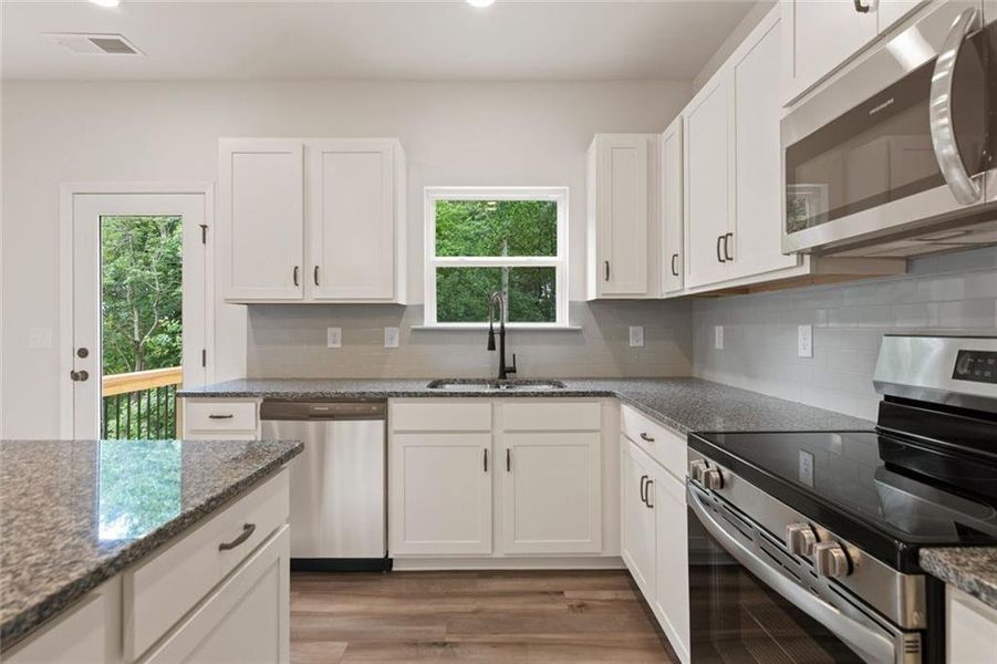 Furnished interior view inside a new home in Roxeywood Park, Winder (Image 10).