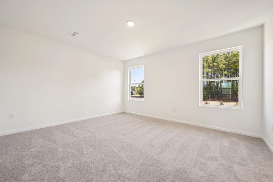 Spacious, unfurnished interior of a new home in Towns at Crescent Mills, Wilson's Mills (Image 24). Spacious, unfurnished interior of a new home in Towns at Crescent Mills, Wilson's Mills (Image 24).