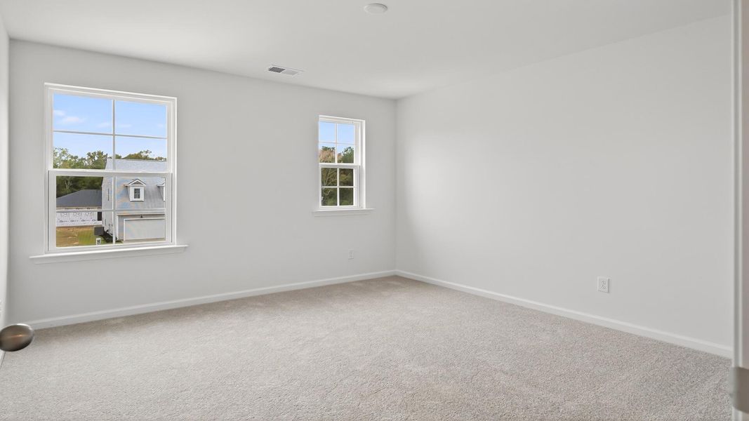 Spacious, unfurnished interior of a new home in Creekside at Andrews, Summerville (Image 20).