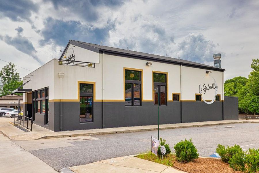 Front exterior of a new home in Magnolia Ridge, Monroe, GA, highlighting curb appeal (Image 19).