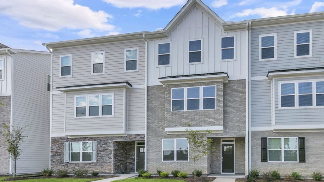 Representative exterior photo of a completed home built from the BLAKELY by D.R. Horton in The Townes at Madden West, Fuquay Varina, NC (Image 2).