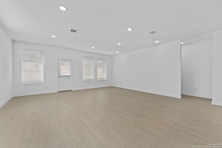 Spacious, unfurnished interior of a new home in Waterwheel: Coastline Collection, San Antonio (Image 21).