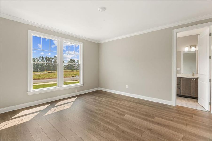 Spacious, unfurnished interior of a new home in The Courtyards at Post Road, Cumming (Image 18).
