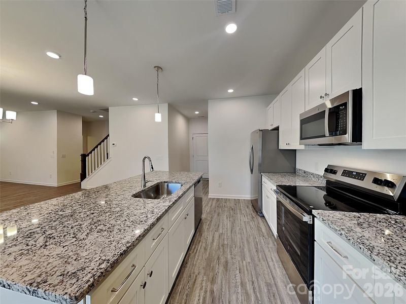 Furnished interior view inside a new home in , Mooresville (Image 11).