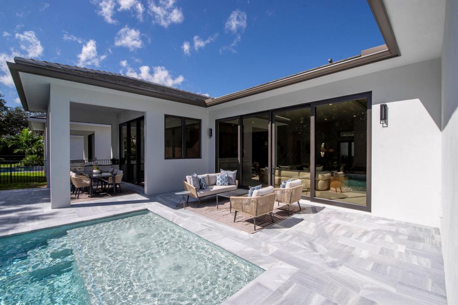 Exterior details and patio area of a home in Symphony at Jupiter, Jupiter (Image 22).