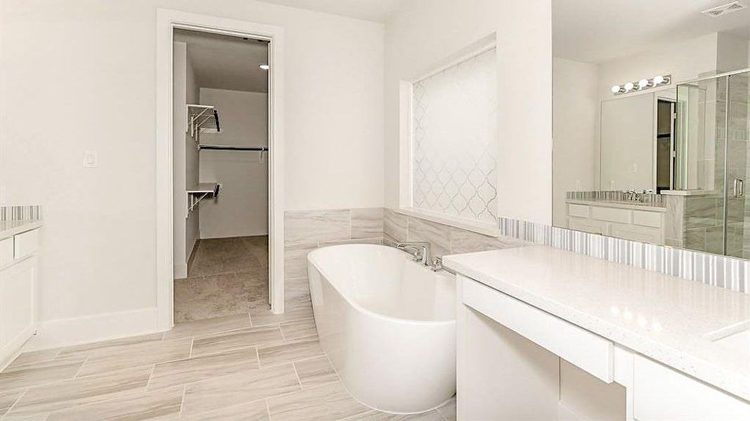 Furnished interior view inside a new home in Grand Central Park, Conroe (Image 11).