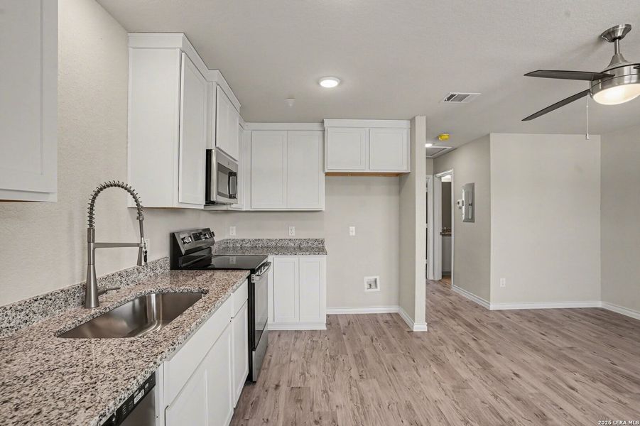 Furnished interior view inside a new home in , San Antonio (Image 8).