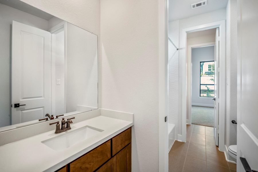 Furnished interior view inside a new home in The Woodlands Hills, Willis (Image 18). Furnished interior view inside a new home in The Woodlands Hills, Willis (Image 18).