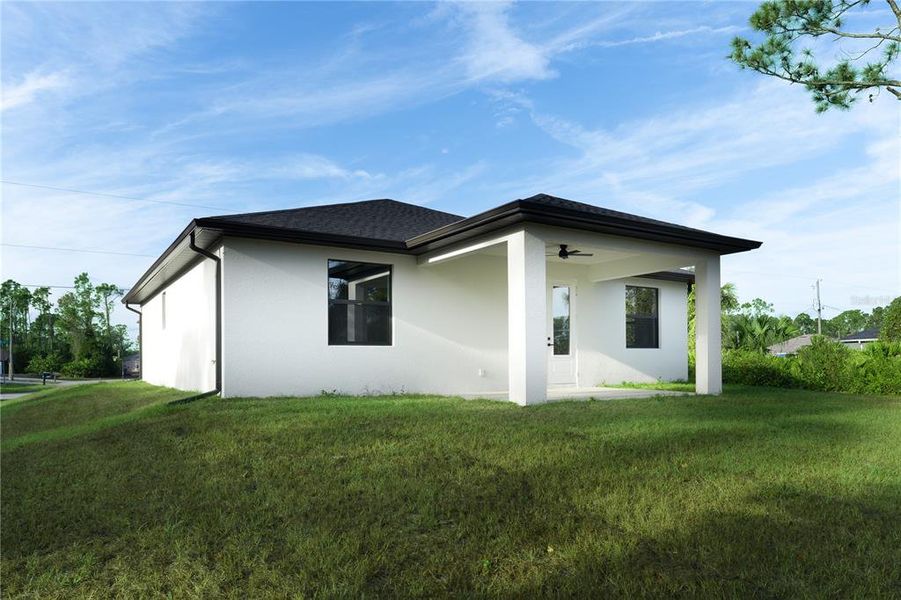 Exterior details and patio area of a home in , North Port (Image 22).