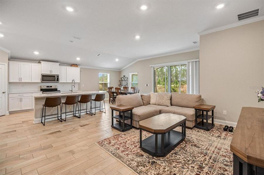 Furnished interior view inside a new home in Sawmill Branch, Palm Coast (Image 8). Furnished interior view inside a new home in Sawmill Branch, Palm Coast (Image 8).