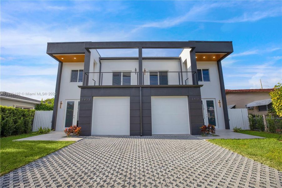 Front exterior of a new home in , Miami, FL, highlighting curb appeal (Image 22).