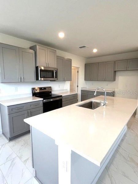 Furnished interior view inside a new home in Hamilton Bluff, Haines City (Image 2). Furnished interior view inside a new home in Hamilton Bluff, Haines City (Image 2).