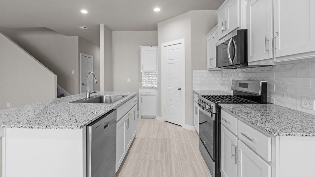 Representative furnished interior of a home built from the Southhaven by D.R. Horton in Legacy South, Midland (Image 5).