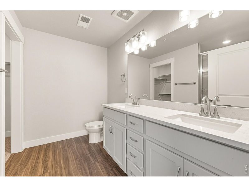 Furnished interior view inside a new home in The Lakes at Centerra - North Shore Flats, Loveland (Image 8).