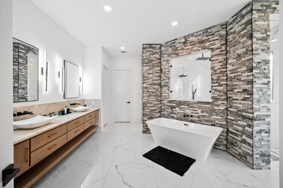 Relaxing soaking tub positioned as the centerpiece of the bathroom.