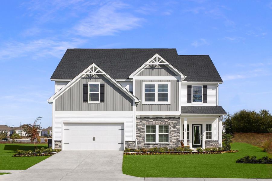 Front exterior of a new home in , Summerville, SC, highlighting curb appeal (Image 1).