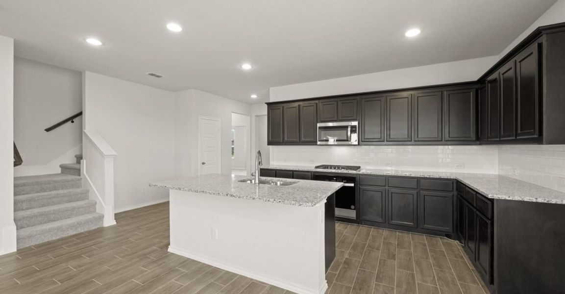 Representative exterior photo of a completed home built from the Brewer by Impression Homes in Redden Farms, Midlothian, TX (Image 8). Representative exterior photo of a completed home built from the Brewer by Impression Homes in Redden Farms, Midlothian, TX (Image 8).