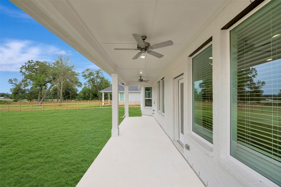 Exterior details and patio area of a home in The Oaks on 6th Street, Magnolia (Image 3).