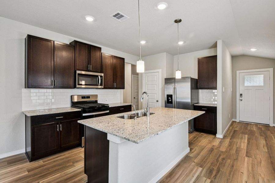 Photo is not of the actual home, but is an inspirational photo of builder’s model home and may depict options, furnishings, and/or decorator features that are not included