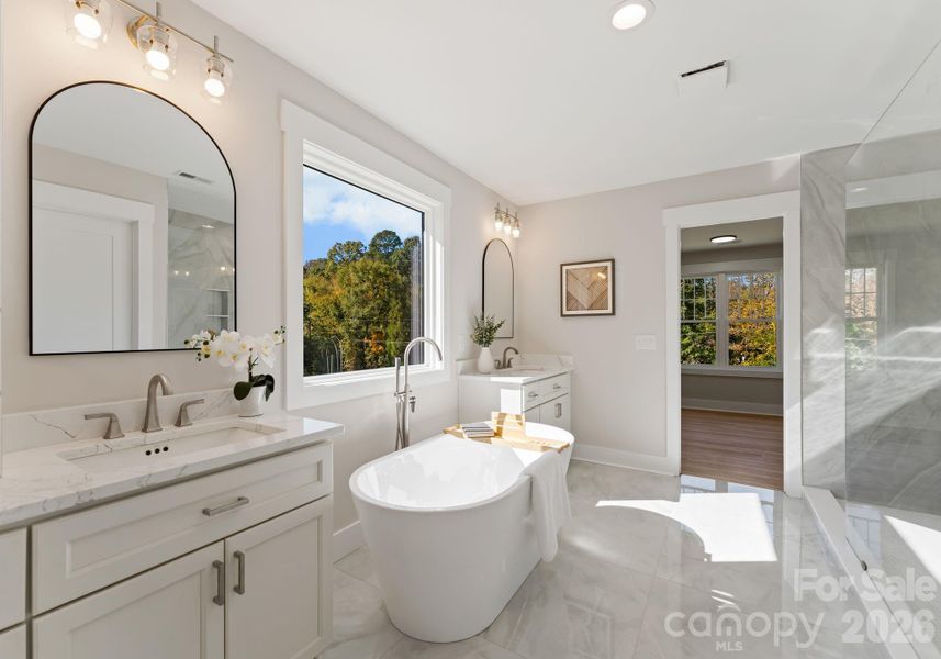 Primary Bathroom with Soaking Tub and Large Tiled Shower