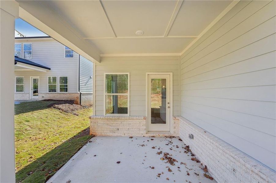 Exterior details and patio area of a home in Westmont Preserve, Powder Springs (Image 26).