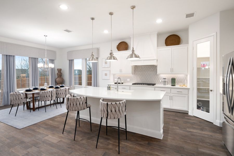 Representative furnished interior of a home built from the Kirby by UnionMain Homes in Lake Breeze, Lavon (Image 37).