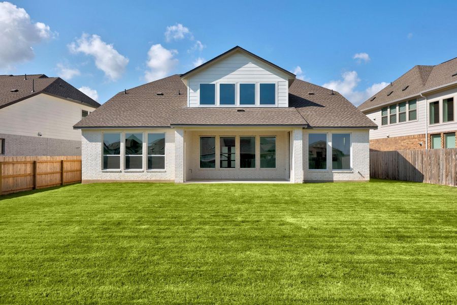 Front exterior of a new home in Santa Rita Ranch - 60', Liberty Hill, TX, highlighting curb appeal (Image 18).