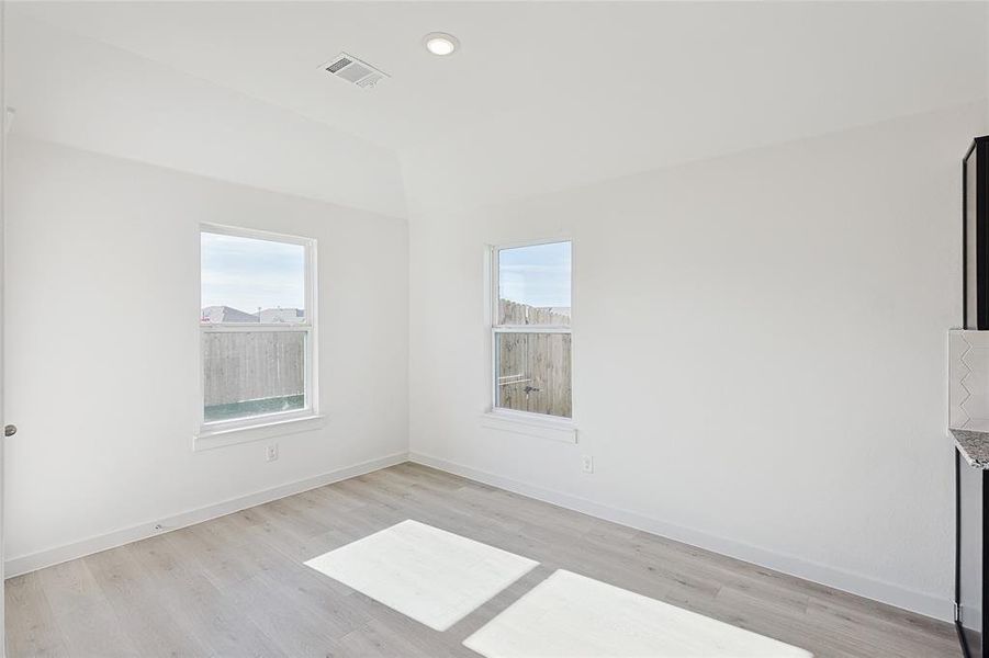 Unfurnished room featuring light hardwood / wood-style flooring