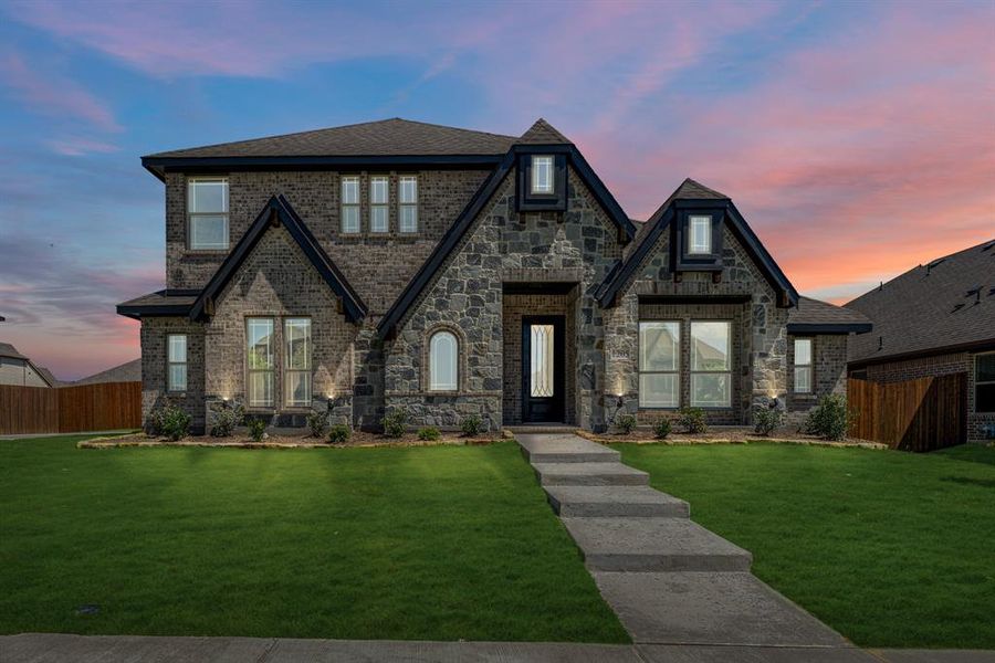 Front exterior of a new home in Trees Farm, DeSoto, TX, highlighting curb appeal (Image 2). Front exterior of a new home in Trees Farm, DeSoto, TX, highlighting curb appeal (Image 2).