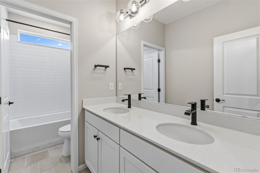 Furnished interior view inside a new home in The Estates Collection at Talon Pointe, Thornton (Image 13).