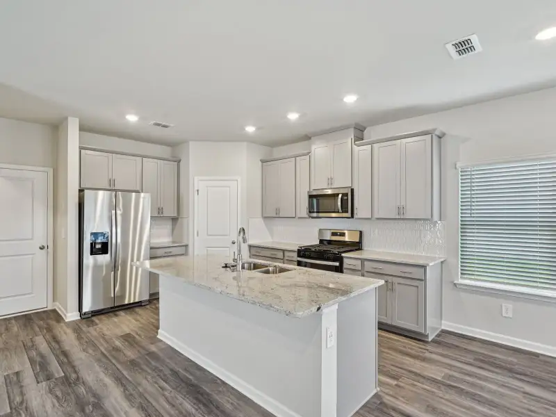 Kitchen in the Thompson floorplan at a Meritage Homes community in Atlanta, GA.