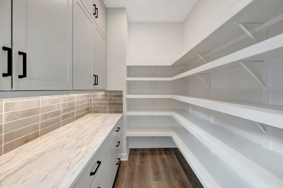 The Butlers Pantry and Pantry are tucked away nicely and LOVED by everyone!