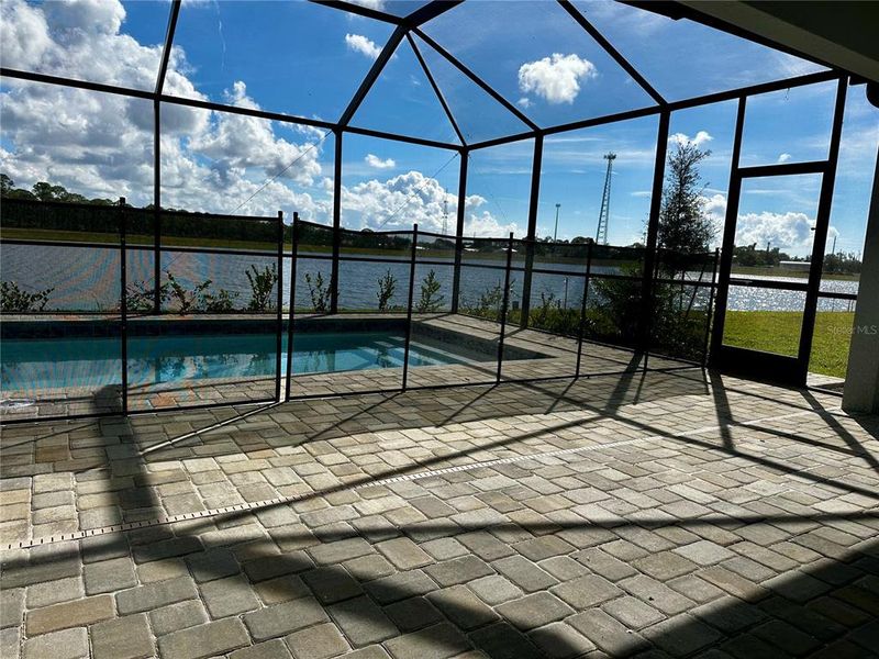Exterior details and patio area of a home in Island Lakes at Coco Bay: Executive Homes, Englewood (Image 15).