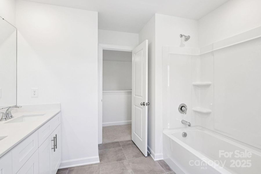 Photo is not of the actual home, but is an inspirational photo of builder’s model home and may depict options, furnishings, and/or decorator features that are not included